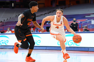 Tiana Mangakahia drives to the net against Miami in Syracuse's 99-64 win over the Hurricanes. 