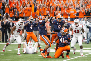 Lewellyn Coker, who was converted into a fullback from a linebacker, has become increasingly involved with the Syracuse offense. He caught a touchdown pass on Saturday versus Louisville. It was his first reception and touchdown.