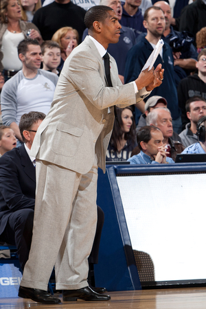 Kevin Ollie is preparing for his first season as Connecticut's head coach, replacing legendary coach Jim Calhoun. Ollie played under Calhoun from 1991-95 before enjoying a 13-year NBA career.