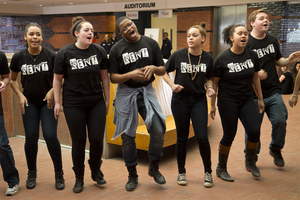 Members of First Year Players perform a song from their upcoming production of 