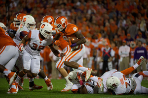 Clemson running back Wayne Gallman runs through tacklers in the Tigers' 16-6 win over the Orange at Memorial Stadium on Saturday night. 