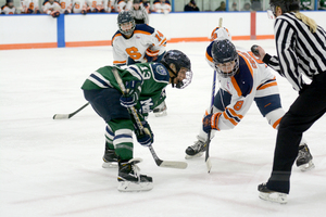 Stephanie Grossi lines up for a faceoff, a spot where she has been one of the Syracuse's best options so far this season. The Orange will look to improve in the faceoff area when it hosts Vermont for two games this weekend. 