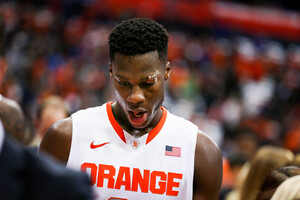 Tyler Roberson walks to the bench with stitches on his eye. He was injured during the game, and turned in an up and down performance in the Syracuse loss to Pittsburgh. 