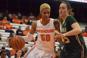 Briana Day drives against Siena on Monday night.