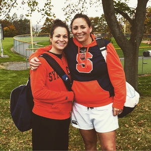 Chrissy Carpenter (left) and her wife, Necole Carpenter, both coach for the women's rugby team.