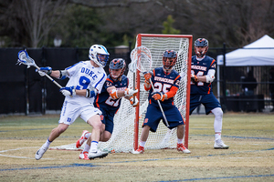 Nick Mellen held the nation’s top scorer, Justin Guterding, to just two points on one goal.