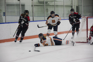 Victoria Klimek (27) threw herself on the ground in an effort to make a play. The Orange made multiple costly penalties throughout the match. 