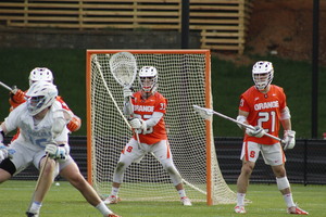 Nick Mellen (right) was one of Syracuse's top cover defenders and finished fifth all-time in program history with 55 caused turnovers. 