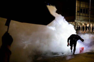 At protests following the death of Daniel Prude in Rochester, SU alumna Maranie Staab photographed interactions between protestors and the police.