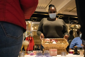 Janisha Smith, owner of CJ’s Creative Candles, said her business took a hit during the pandemic, but the market offered her a safe space to connect with customers in-person.
