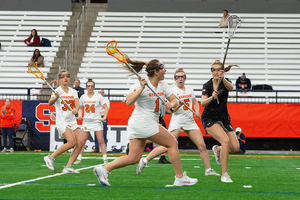 No. 7 Syracuse's Olivia Adamson scored four goals and got some playing time as the draw control specialist in SU's win over UAlbany. 