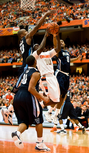 Jonny Flynn struggles to put up a layup during No. 24 Syracuse's 89-86 loss to No. 12 Villanova Sunday at the Carrier Dome. Flynn scored 12 points and missed a wide-open 3-point shot with 10 seconds remaining in the second half. The loss was the Orange's second to the Wildcats this season. 