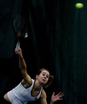 Emily Harman hits the ball during the Syracuse tennis team's 5-2 victory over Buffalo. Harman lost her match at the No. 1 singles spot 7-6 (4-0), 2-6, and 12-10.  