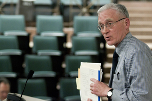 Gary Pavela, director of the Academic Integrity Office, present survey results on the Academic Integrity Policy at a forum in Maxwell Auditorium Wednesday. The survey showed 38 percent of students think people who are academically dishonest have an unfair advantage.