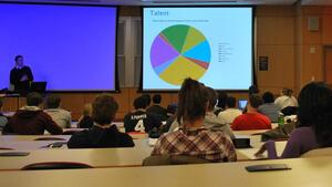 Rob Dekker, University Union president, speaks to the Student Association on Monday night about how the organization makes concert date and performance selections.