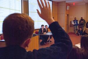 Dylan Lustig (right) and Stephen DeSalvo, president and comptroller of the Student Association, respectively, field questions during the budget meeting held Monday night. DeSalvo presented bills alocatting funds to organizations from the Fall 2012 programming.