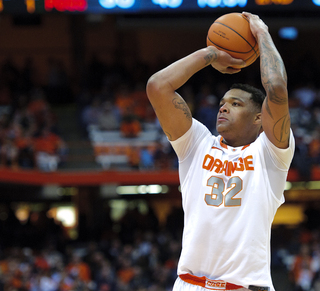 Syracuse forward DaJuan Coleman attempts a free throw.