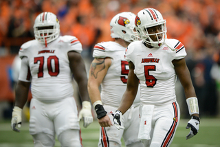 Louisville quarterback Teddy Bridgewater looks toward the sideline in between plays.