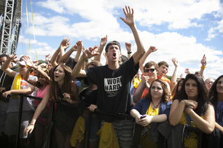 (center) Mark Gschwind, a freshman in the L.C. Smith College of Engineering and Computer Science, enjoys Smallpools' set surrounded by other students.