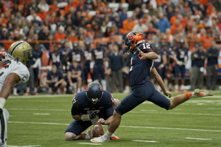 Syracuse kicker Ryan Norton attempts a field goal.