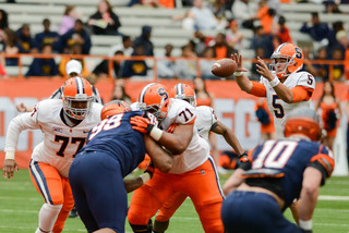 Austin Wilson takes a snap. Wilson completed all six of his passes for 124 yards and two touchdowns.