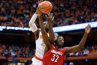 Rakeem Christmas and freshman Chinanu Onuaku fight for the ball. Christmas held the younger brother of former Orange Arinze Onuaku to four points in the first half.