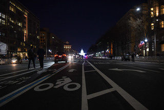 Tourists were allowed to walk along the parade route leading to the Capitol Building the night before the inauguration.