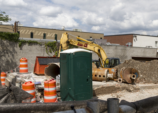 More equipment has moved to the South Crouse Avenue area that previously held multiple Syracuse student staples. A multistory complex is now being built on the site. Photo taken July 11, 2017