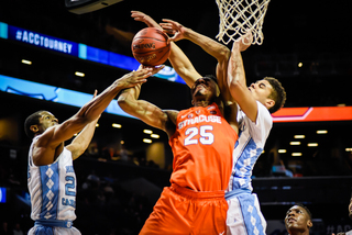 Battle is stuffed at the rack. UNC had four blocks and eight steals. 