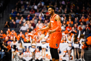 Brissett cheers after a 3-pointer went through the net. He recorded his 13th double-double of the season, knocking down 7 of his 15 shot attempts from the floor. 