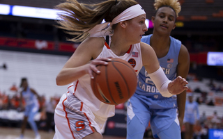 Tiana Mangakahia netted her first triple-double for the Orange with 34 points, 10 assists and 10 rebounds.