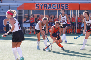 Junior Claire Cooke takes possession of the ball from Lafayette College.